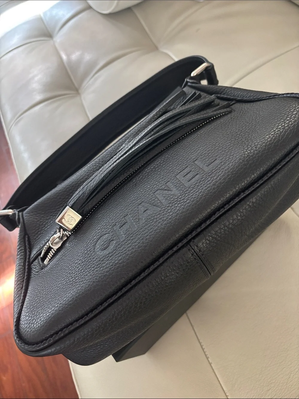 CHANEL Black Pebbled Leather Shoulder Bag with Tassel Zip